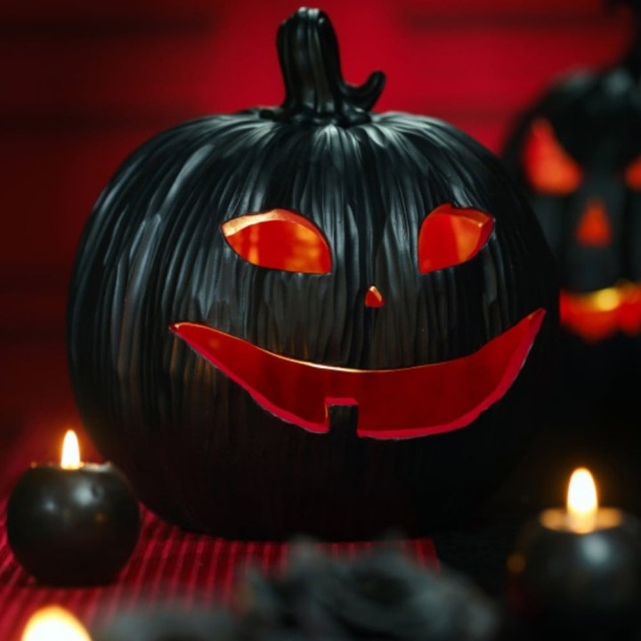 Citrouille résine lumineuse noir et rouge - Décoration Halloween